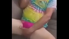 Kicked back on the couch enjoying a toy Thumb
